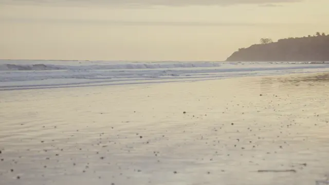 Dusk Serenity at Bolinas Beach, California: Gentle Waves & Coastal Bluffs