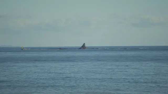 Eboshi Rock & Fishing Boat off Chigasaki Beach, Japan
