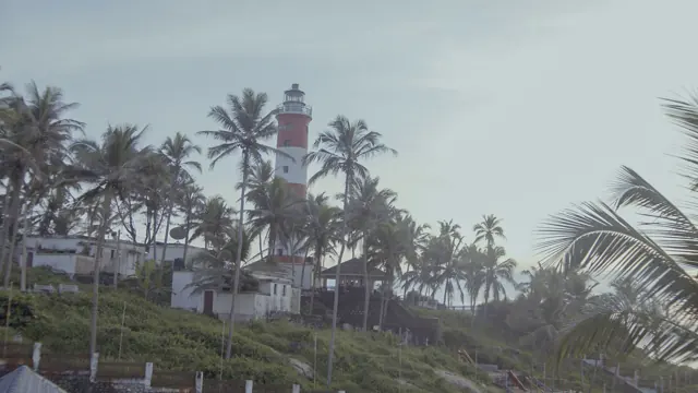 Vizhinjam Lighthouse at Hawa Beach, Kerala, India - Coastal Icon