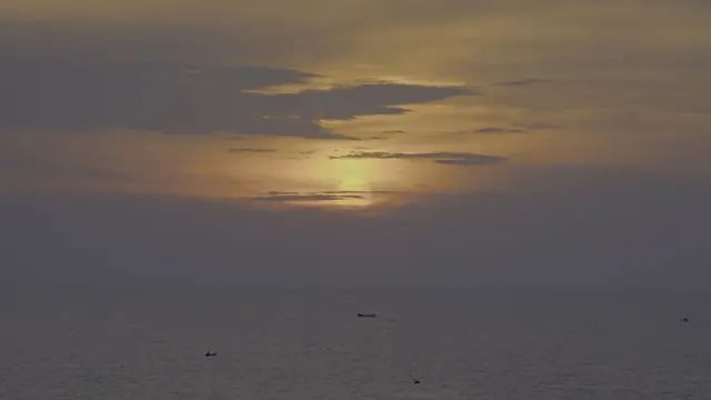 Hawa Beach Sunset: Golden Horizon, Fishing Boats in Kerala, India